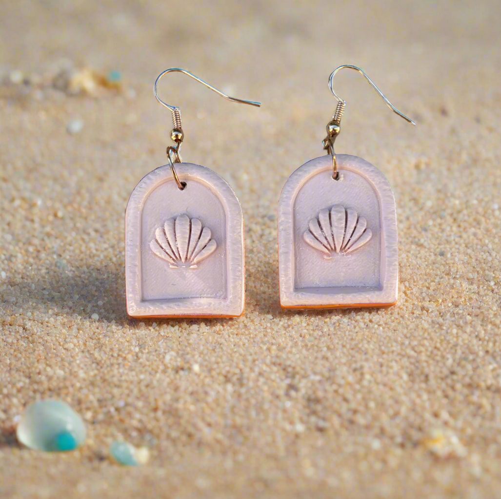 Pink hanging earrings framed shell